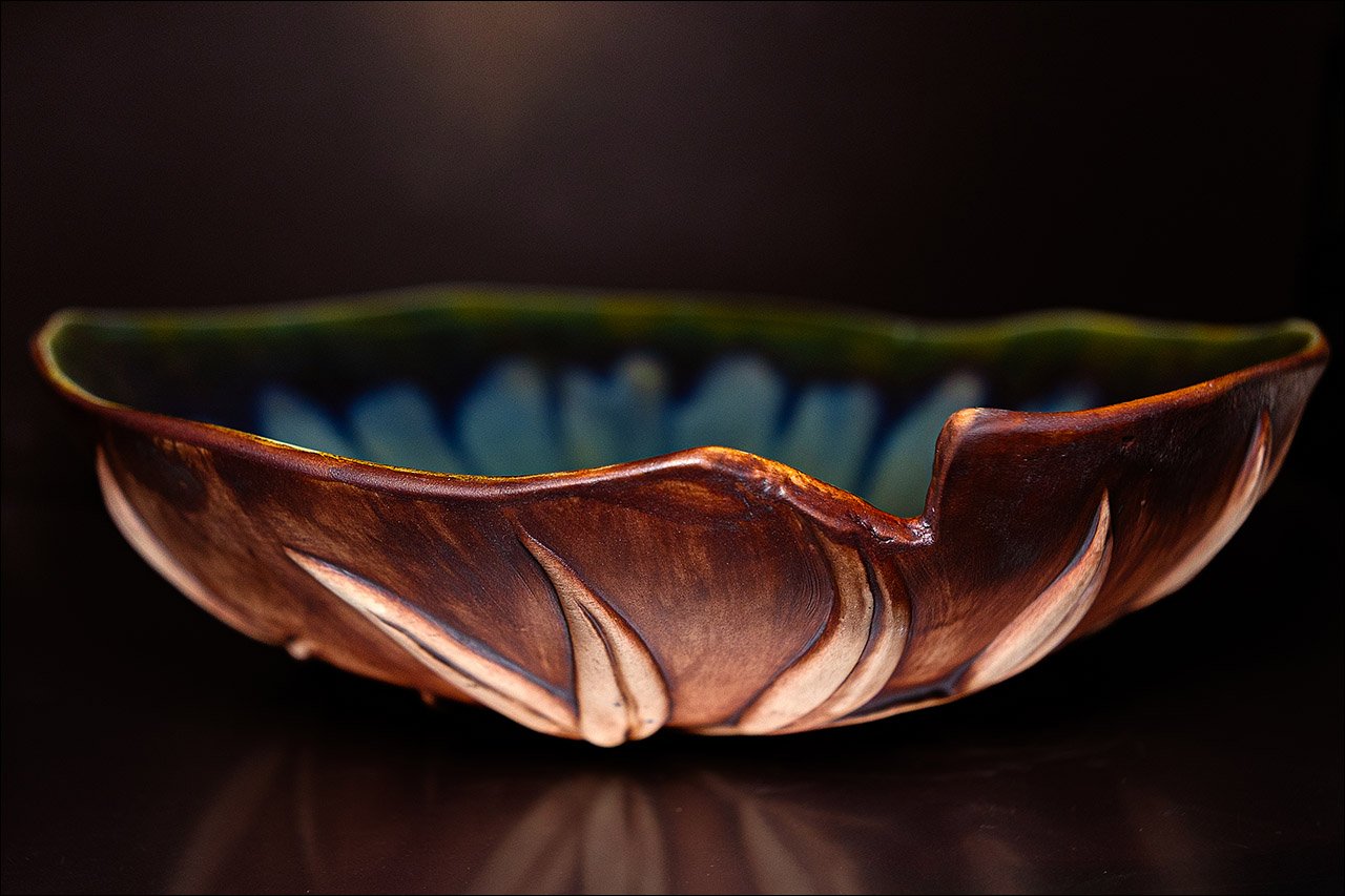Handcrafted and nature-inspired porcelain decorative bowl by Leona Darnell.
